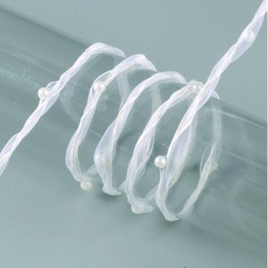 Garneringsband ståltrådsförstärkt organza pärlor 8 mm - 20 meter - vit Garneringsband ståltrådsförstärkt organza pärlor 8 mm - 20 meter - vit
