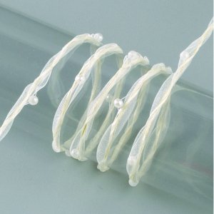 Garneringsband ståltrådsförstärkt organza pärlor 8 mm - 20 meter - grädde Garneringsband ståltrådsförstärkt organza pärlor 8 mm - 20 meter - grädde