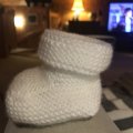 Kundbild Junior 50g - Vit: En liten baby socke.