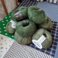Kundbild DROPS Kid-Silk Uni Colour garn - 25g - Mörk grön (19): Vacker mörkgrön färg. Fin att...